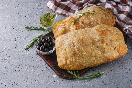 Fragrant freshly baked traditional Italian ciabatta on a stone rustic background