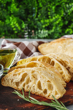 Fragrant freshly baked traditional Italian ciabatta on a stone rustic background