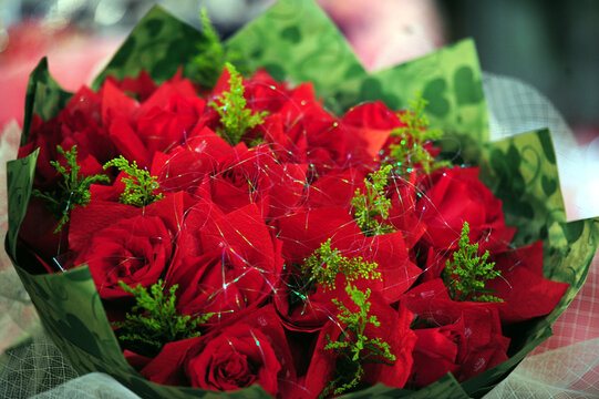 Red Rose Bouquet with Green Foliage and Romantic Floral Arrangement