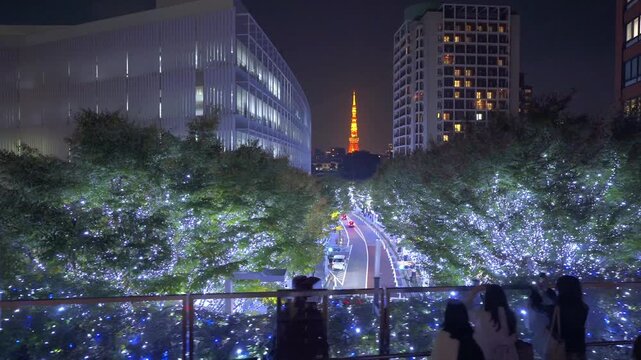 Magical winter illuminations along Keyakizaka street in Roppongi Hills, with Tokyo Tower in the distance