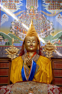A gilded statue of Atisha, a Gelugpa master, at a Buddhist meditation center in Dharamkot, Himachal Pradesh, India.