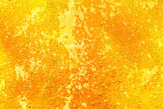 Golden orange glitter texture abstract banner background with space. Twinkling glow stars effect. Like outer space, night sky, universe. Rusty, rough surface, grain.