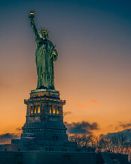 statue of liberty at sunset © Carlos
