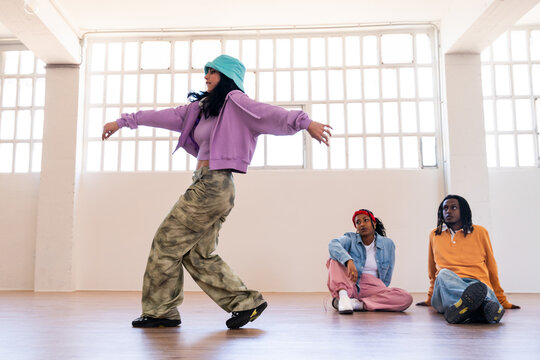 Young group of multiethnic hip-hop dancers dancing