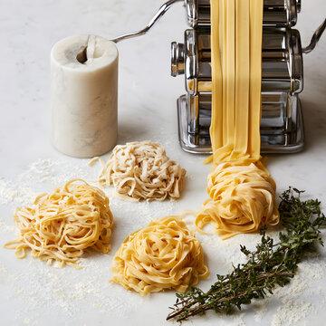 Three kinds of fresh pasta using a pasta maker and herbs