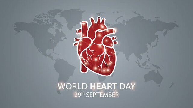 Anatomical human heart graphic over grey world map background for World Heart Day.