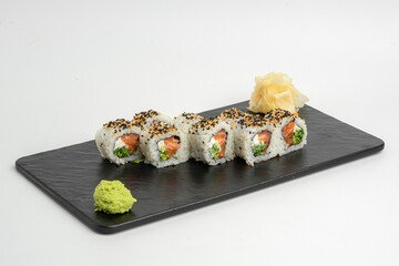 Salmon Uramaki with Wasabi on Black Plate © nayefhammouri
