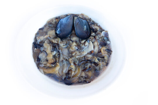 Fruits of the sea, denizen of the sea. Shelled clams in a bowl. Mussels, oyster, cockles, anadaras, etc. Regale ready-to-cook dish. Dish mentioned in molluscivorous Herman Melville's novel Moby Dick