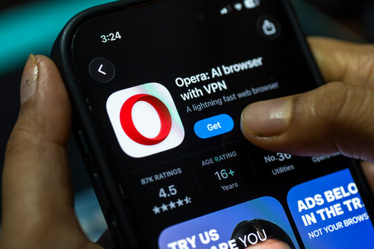 In this photo illustration, a person holds a smartphone displaying the Opera browser app on the App Store, in New Delhi, India on 8 August 2026.