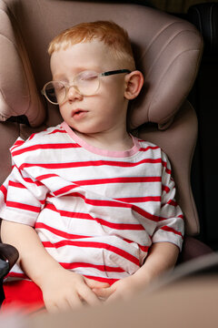 The child fell asleep in the car seat