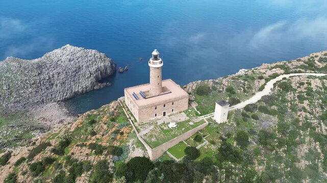 Capo Sandalo Lighthouse Overlooking the Mediterranean Sea on San Pietro Island