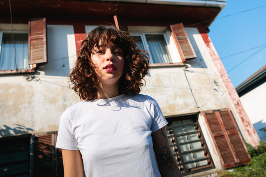Serene female face near shutter
