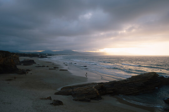 Serene Coastline During Sunset