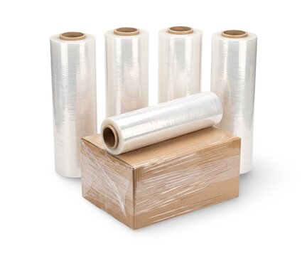 Plastic stretch wrap rolls with wrapped cardboard box, packaging supplies isolated on white background