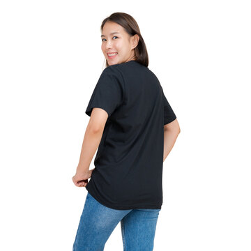 Young woman in black t-shirt and blue jeans posing for a product shot