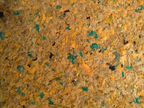 Close-up abstract pattern of speckled recycled foam padding