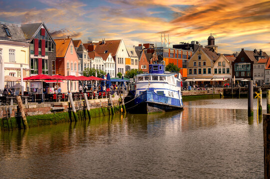 Sunset over the historic harbor of Husum in Schleswig-Holstein