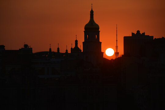 Kyiv, Ukraine - August 6, 2026: Sunset against the backdrop of St Sophia's Cathedral. The hottest day in recorded history, when the daytime temperature reached 39 degrees Celsius.