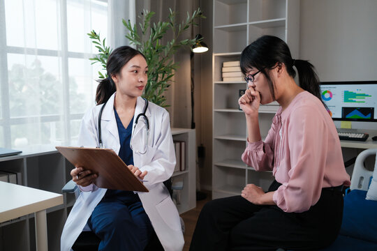 Doctor consulting patient experiencing cough symptoms