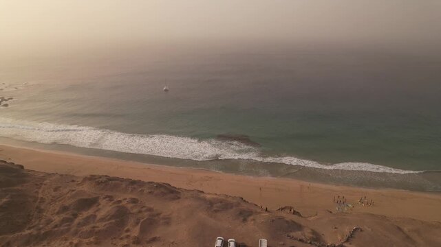 Beach in Fuerteventura, Canary Islands, during a sandstorm, 4k 30fps aerial footage, 1 inch sensor drone
