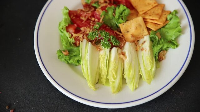 Chicory salad appetizer food preparation vegetable dish tasty snack fresh and delicious gourmet rustic food background on the table rustic food top view copy space keto and paleo diets vegetarian and 