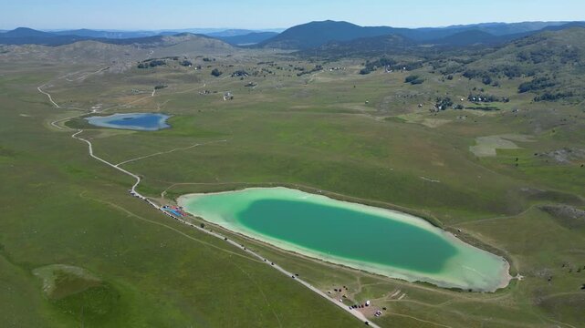Drone View of Devil's Lake and Fish Lake in Durmitor, Montenegro Surrounded by Mountain Landscape