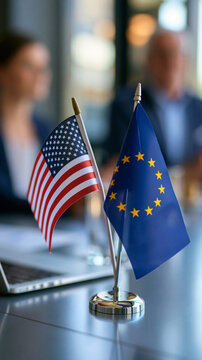 two desk flags standing on a bright meeting table implying bilateral diplomatic talks, partnership concept, negotiation, cooperation, formal meeting, international relations,