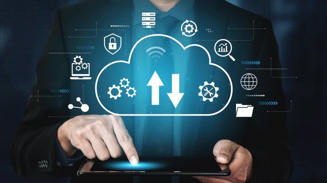 Business Professional Using Digital Tablet with Cloud Technology Icons Representing Data Transfer and Security Concepts. Entropy.