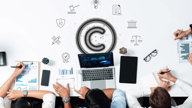 A business team engaged in a meeting about copyright and intellectual property, featuring various icons and a laptop, highlighting collaboration and strategy in a professional setting. Raster