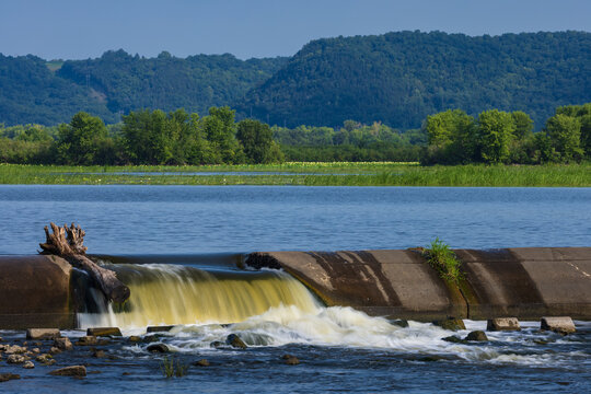 A Dam with Waterfall On The Mississippi River