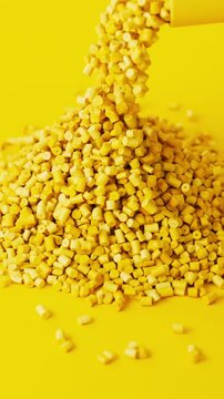 Yellow polypropylene plastic granules pouring from a cup onto a resin pellet pile on yellow background, 3D render dynamic Vertical video.