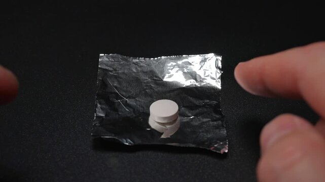 Public health crisis as the opioid epidemic. Illicit trade of prescription pain medications on the streets. Street market supplies of pharmaceutical products synthetic opioids tramadol and oxycodone.
