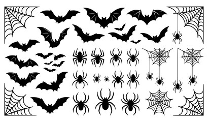 Fototapeta premium Set of black silhouettes featuring bats spiders and spider webs isolated on a white background for halloween
