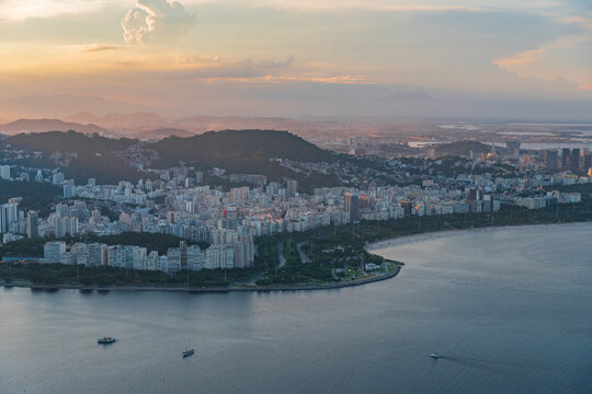 Sunset over Guanabara bay and coast of Rio de Janeiro, panoramic Brazil travel background with copy space