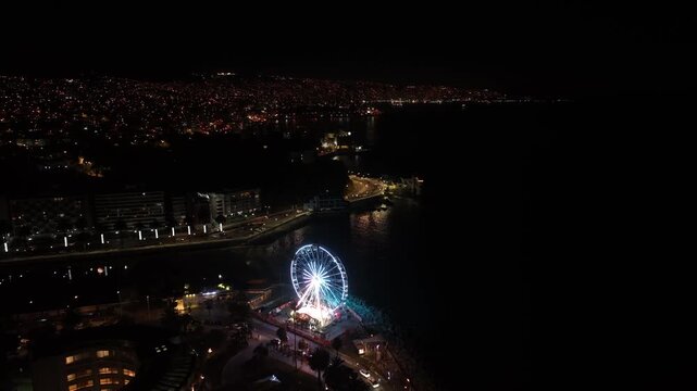 Aerial View of Illuminated Ferris Wheel at Night in Vina del Mar, Chile