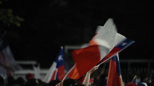 Supporters Wave Chilean Flags During Celebration After Jos&eacute; Antonio Kast Presidential Election Victory in Chile