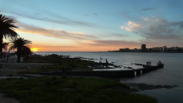 Sunset timelapse over Playa Ramirez and Rio de la Plata, Montevideo, Uruguay