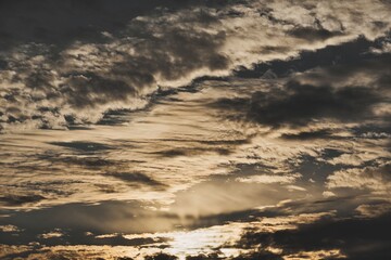 Obraz premium Dramatic Sky with Cloud Layers at Sunset