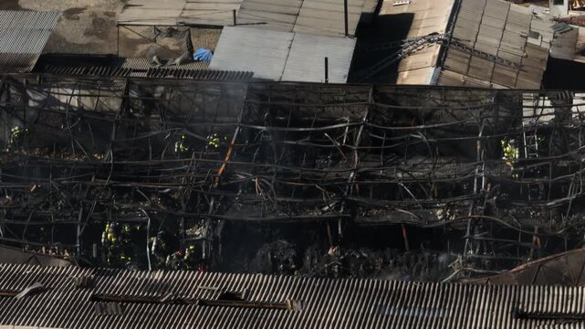 Aerial View of Fire Damaged Industrial Warehouse After Devastating Blaze
