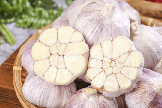 Fresh Purple Garlic Bulbs from Shandong Henan China in Wooden Basket - Asian Cooking Ingredient