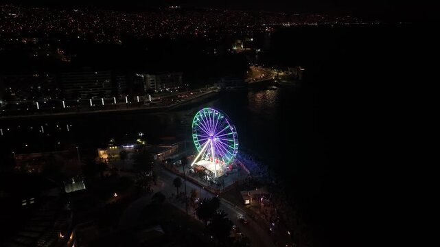 Aerial View of Illuminated Ferris Wheel at Night in Vina del Mar, Chile