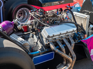 Fototapeta premium Abstract car engine close up with mechanical details