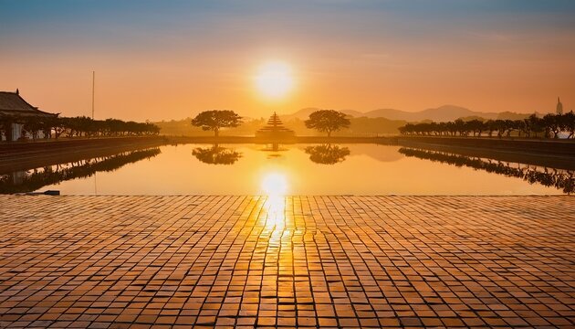 Serene Sunrise Over Ceramic Tiled Prang With Glowing Reflections On Water In Soft Golden Light
