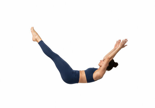 Woman performing yoga boat pose on white background