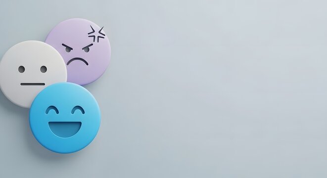 Three colorful paper mache emoji faces showing sad, angry, and happy expressions on plain background