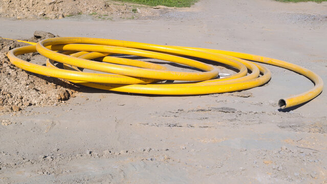 Construction Site with Coiled Hose