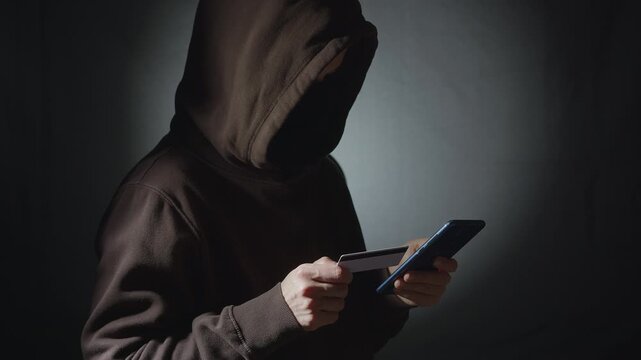 Scammer Hacker Using Phone and Credit Card for Online Fraud