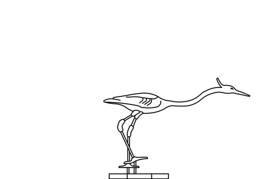 Simple line drawing of an elegant heron or crane bird standing on a pedestal base. Black and white outline illustration showing the characteristic long neck, legs, and beak of the wading bird.