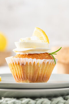 Delicious lemon cupcake with white cream frosting