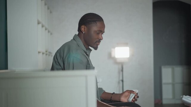 Patient reviews results. Person examines medical information calmly. Individual analyzing health data post consultation. Patient carefully assesses clinical results with focused concentration